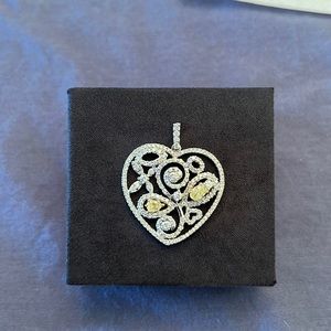 18k WHITE GOLD HEART PENDANT WITH WHITE AND YELLOW DIAMONDS